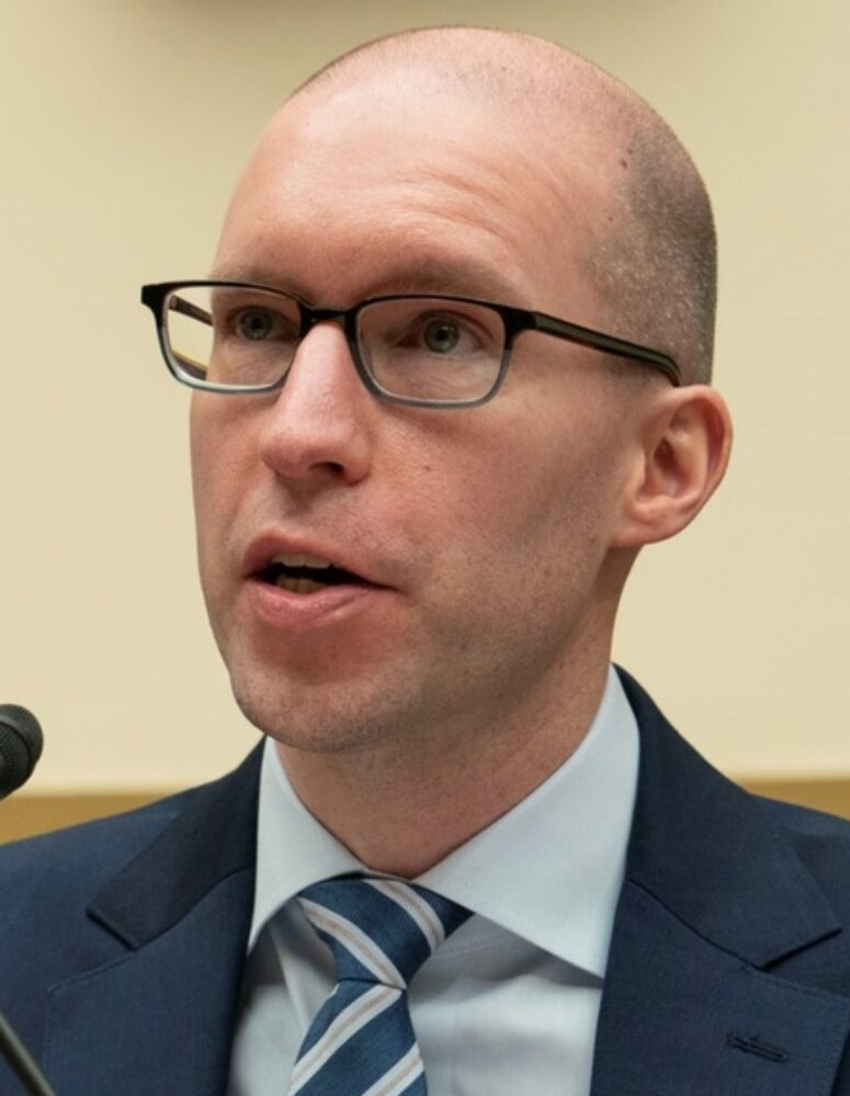 a man wearing a suit and tie